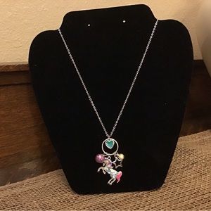 NWT Justice necklace. Unicorn, heart, glitter ball, star and rhinestone charms.